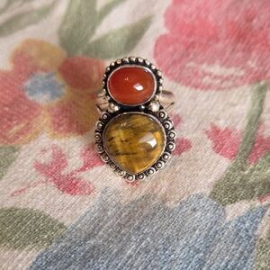 Elegant Silver Ring with Orange and Brown Stones